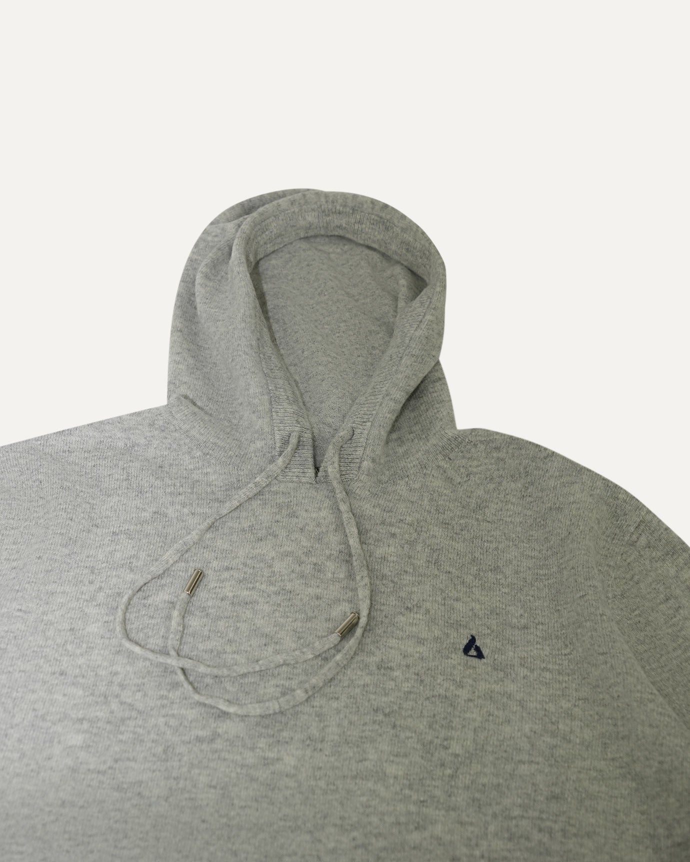 Minimalist gray hoodie with bold navy branding