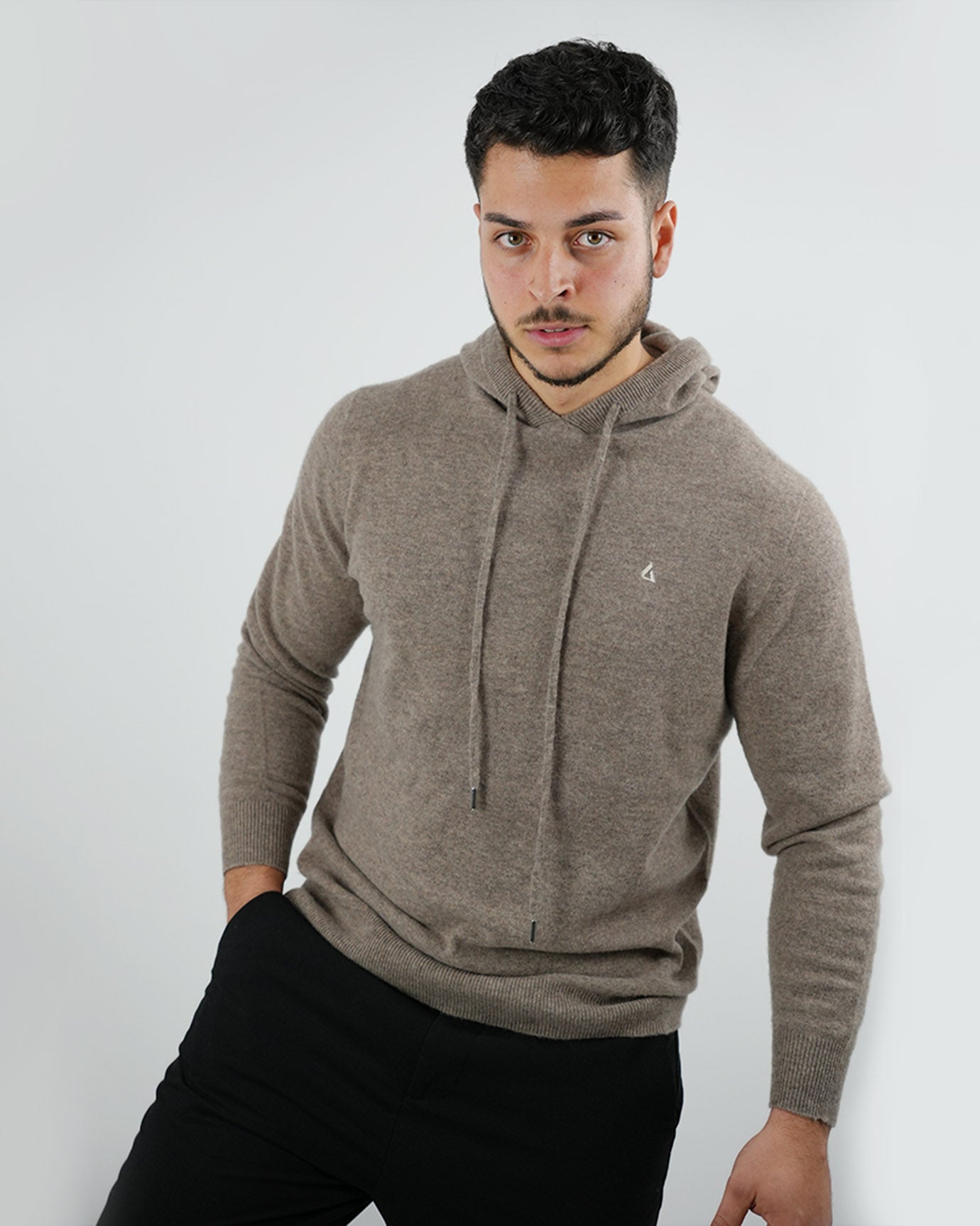 Natural camel tone hoodie with subtle logo contrast