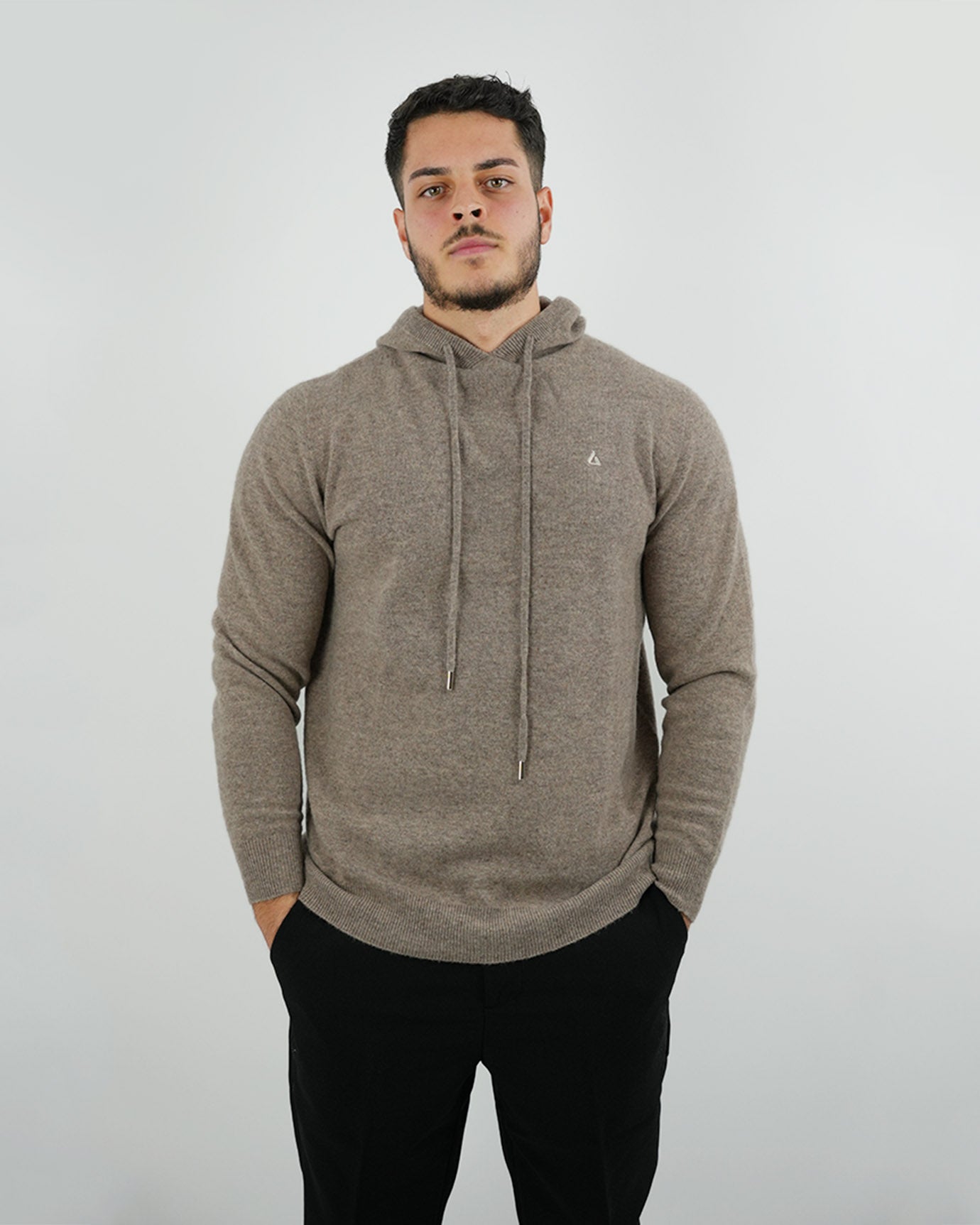 Camel Classy hoodie styled with cream trousers and loafers