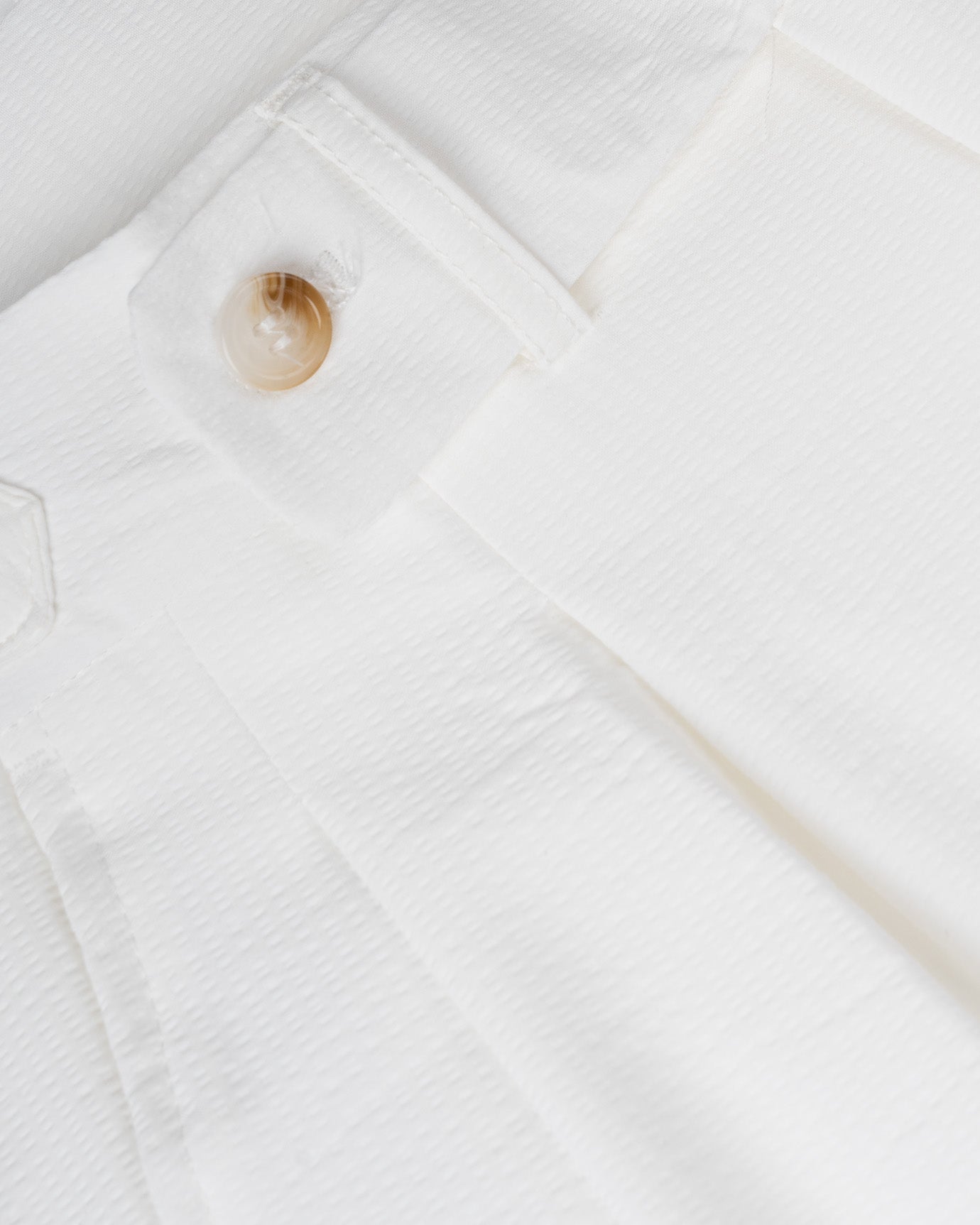 Lightweight white Paris shorts with moisture-wicking material