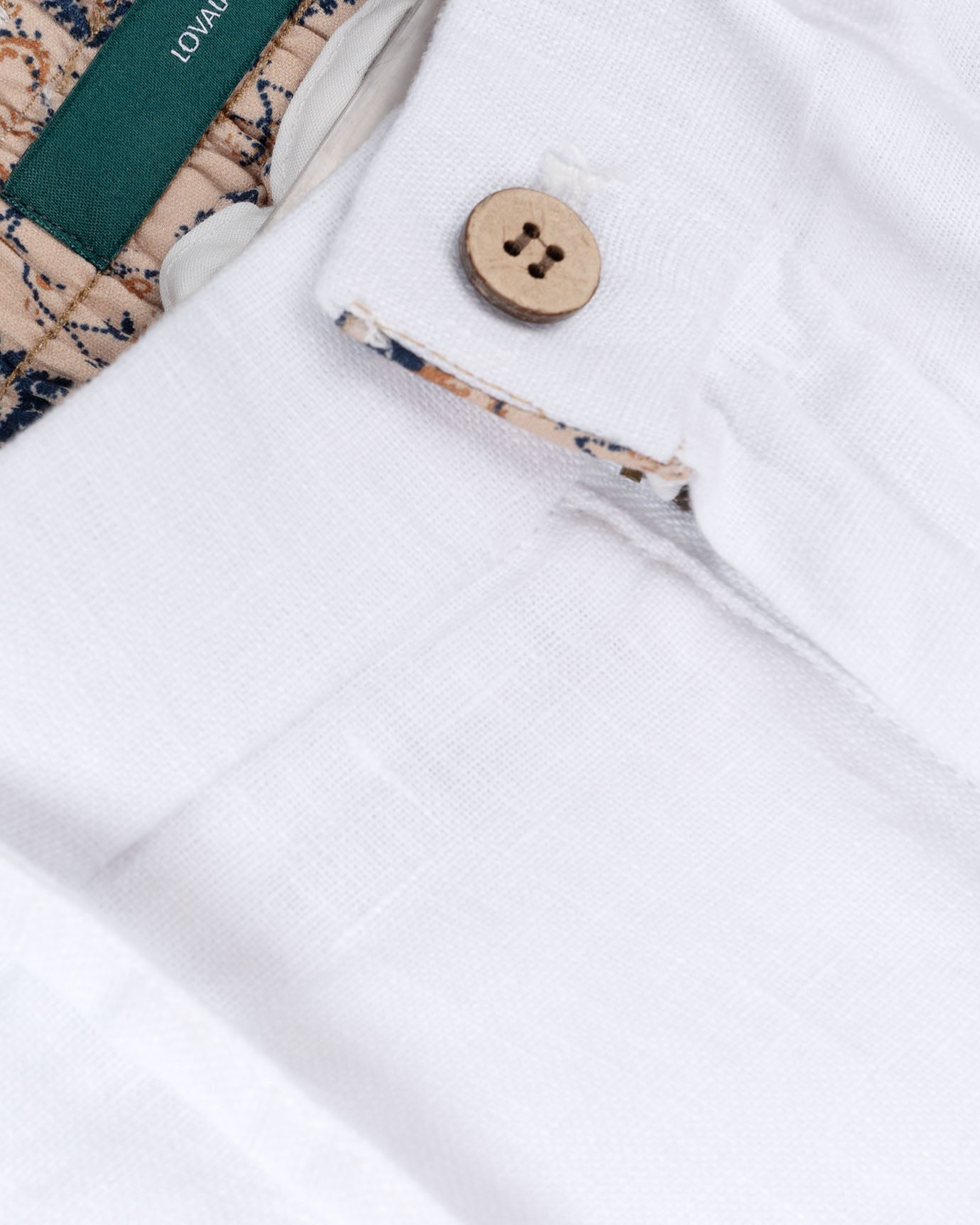 Stylish white linen trousers from the Ibiza Vice limited edition collection, perfect for summer