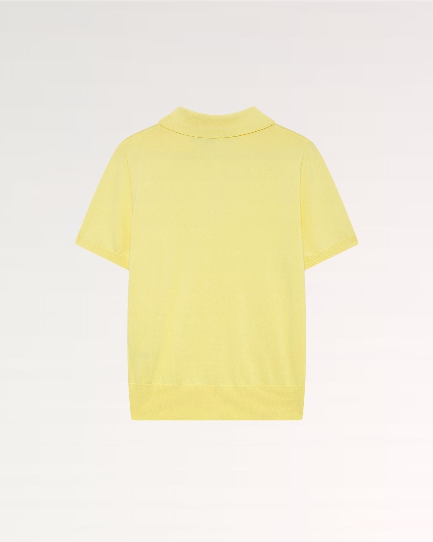 Back view of yellow polo shirt with clean, simple design