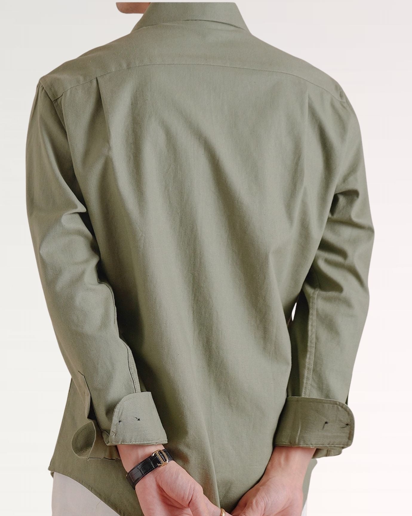 Back of cotton linen shirt showing clean seams and smooth fabric drape