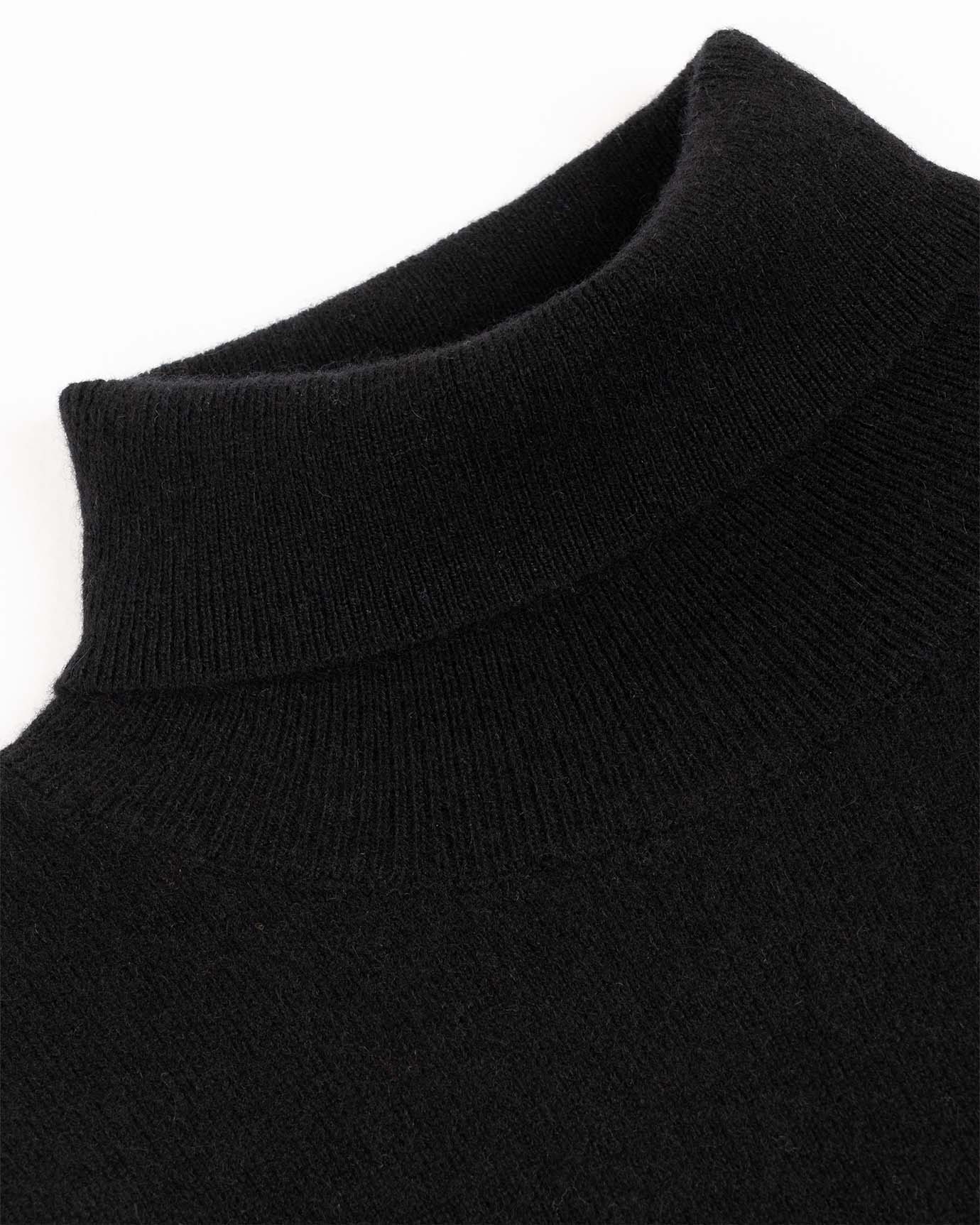 Black cashmere turtleneck sweater with refined silhouette