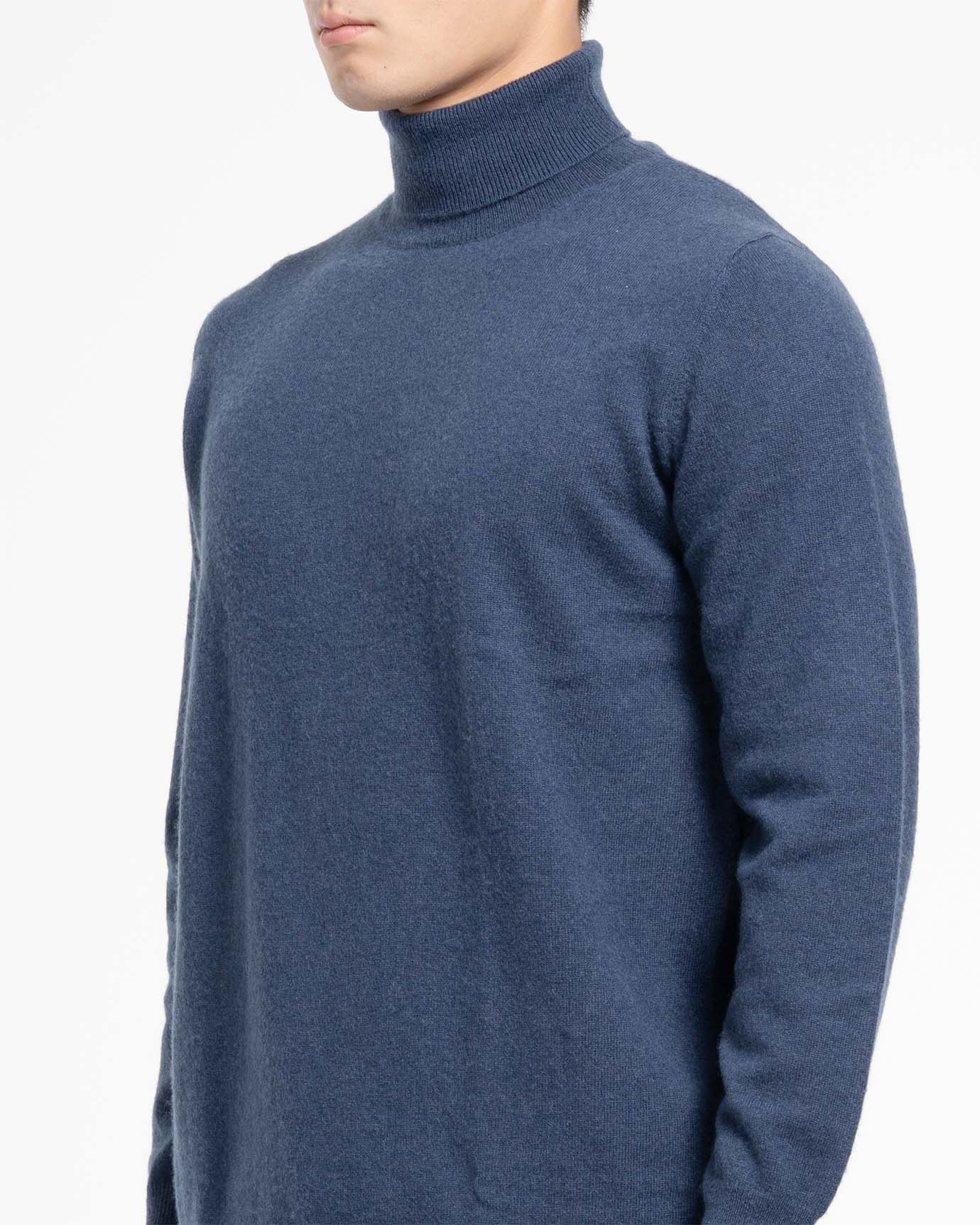 Bright Flower Blue turtleneck sweater worn by male model
