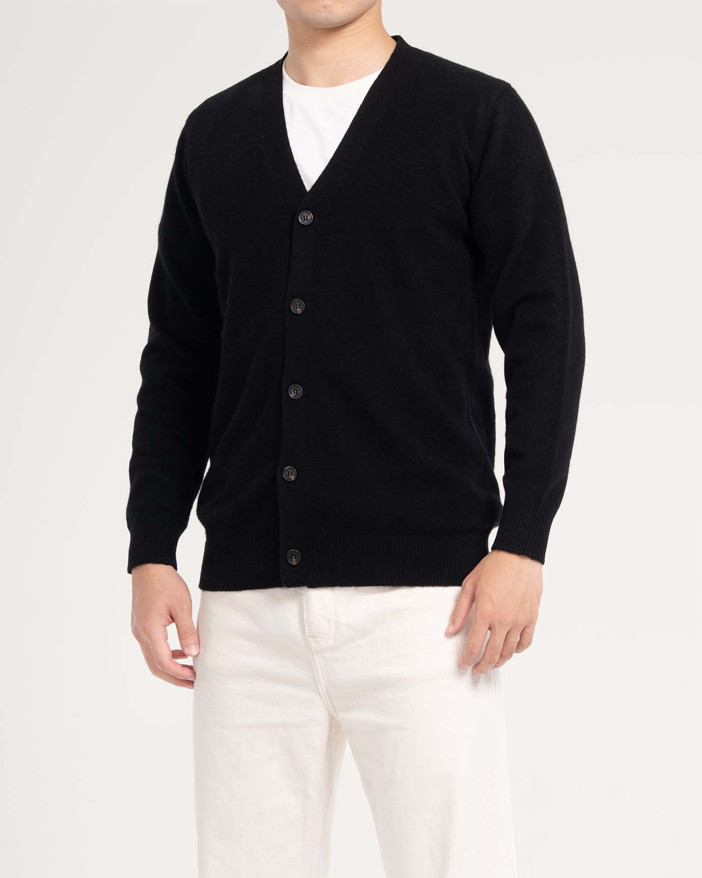 Model wearing vintage-inspired Old Money cardigan in black