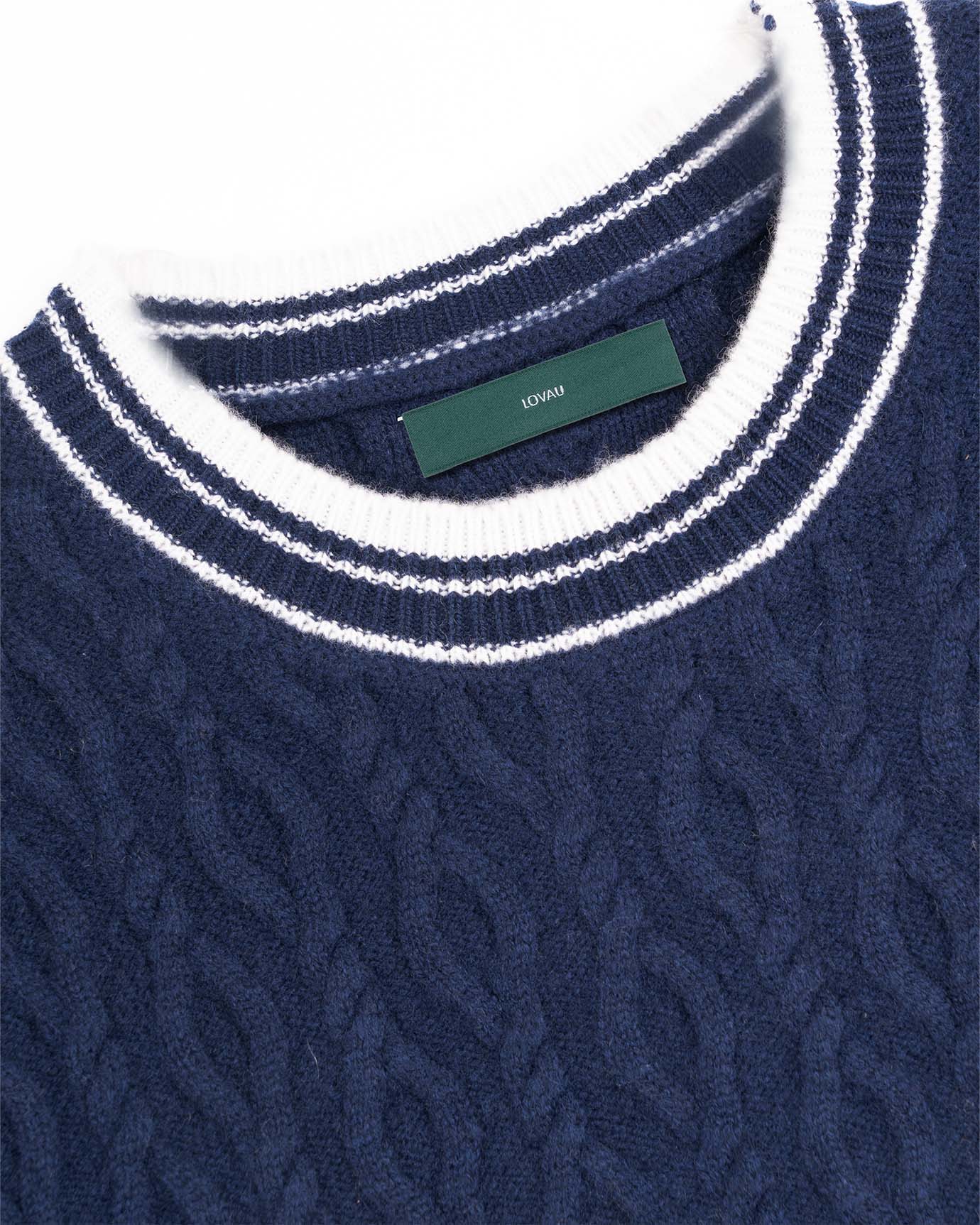 Heritage-style sweater with blue trim and classic knit texture