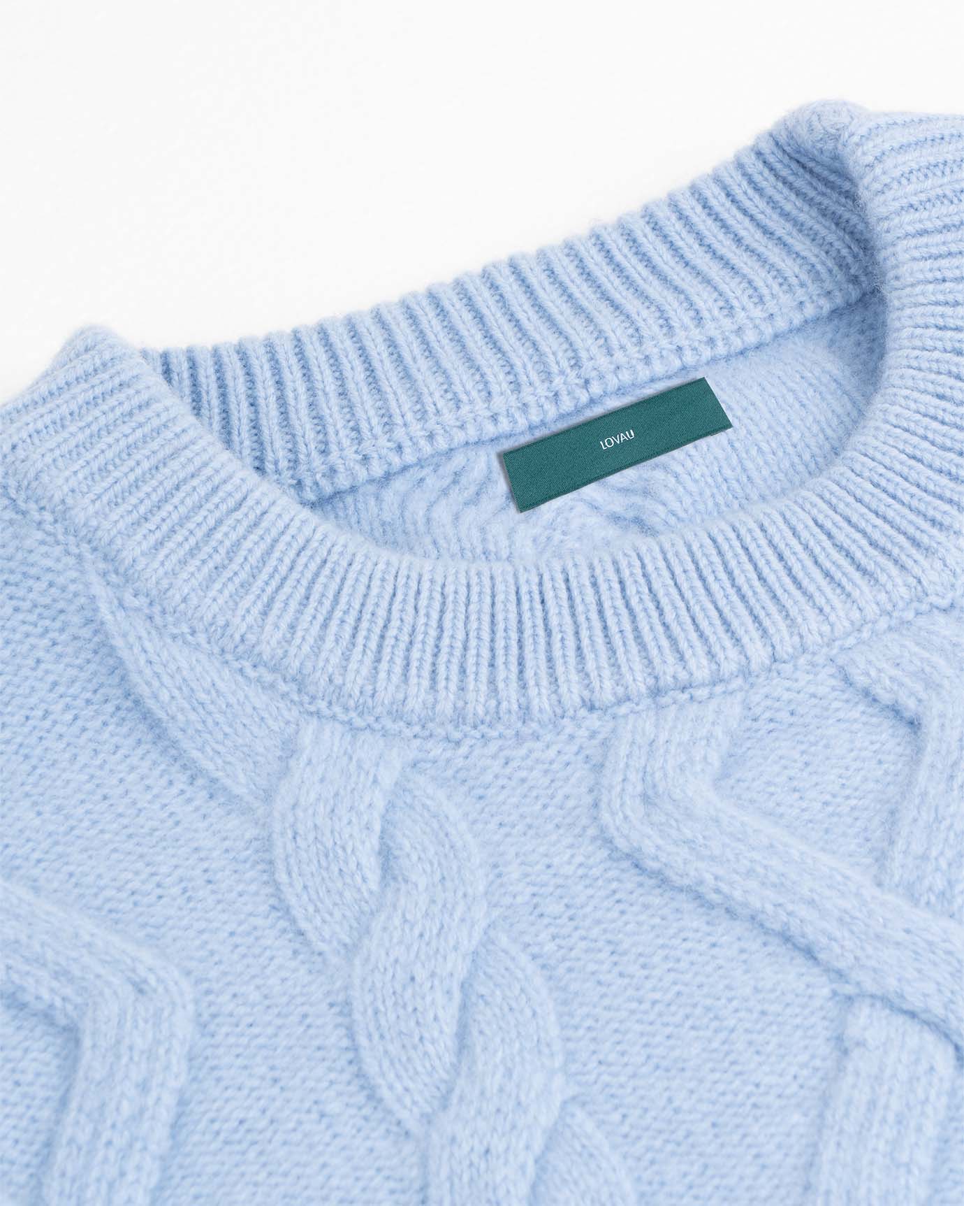 Classic men’s cashmere sweater styled with tailored trousers