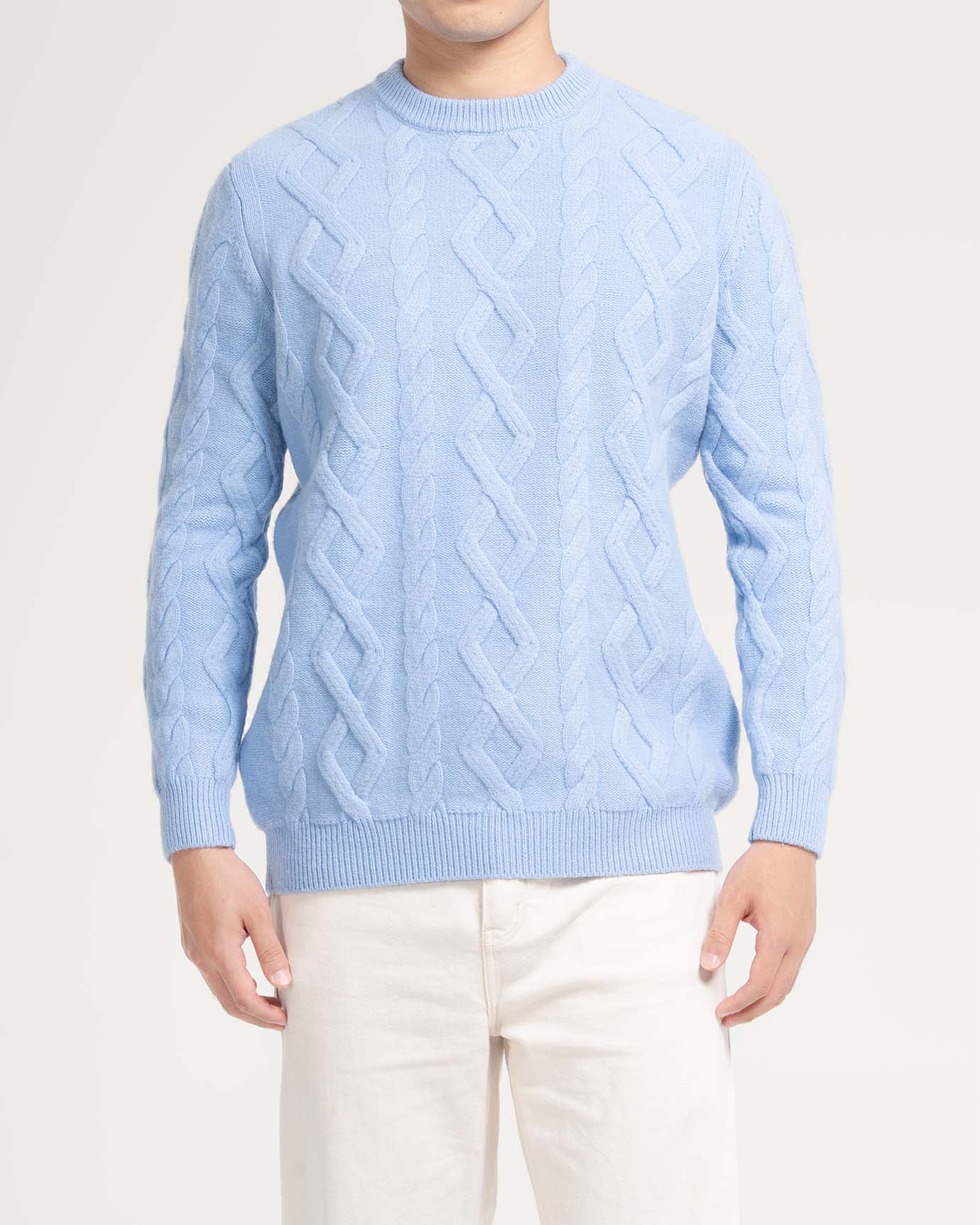 Model wearing premium cashmere and wool sweater in neutral tone