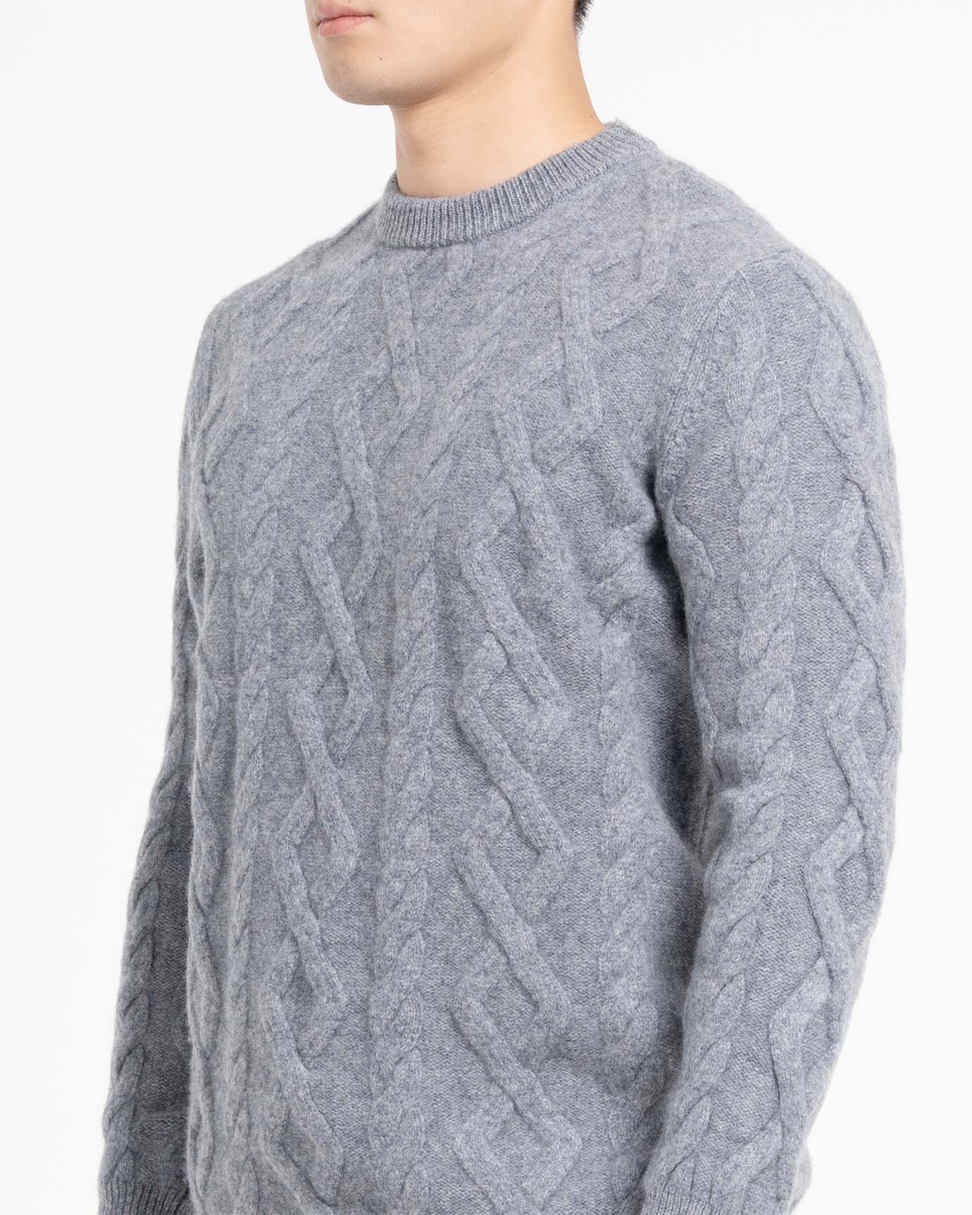 Neutral-toned cashmere sweater photographed under natural light